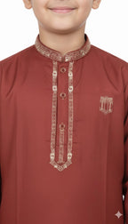 Close up of embroidery design on boys kurta collar and placket.